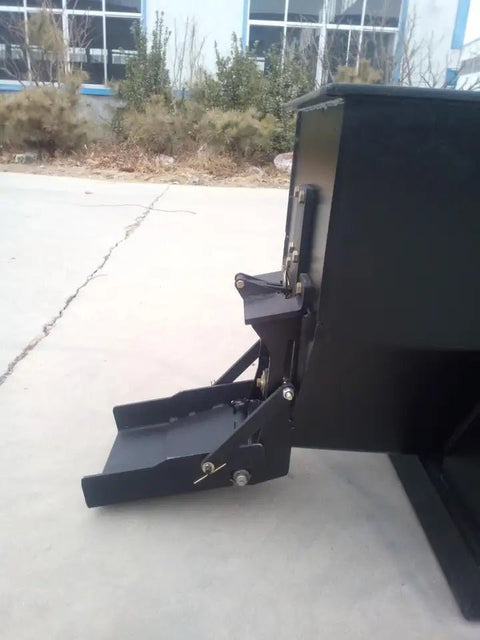 Side dumping concrete mixer bucket with auger for skid steer
Rear view of mixer bucket showing hydraulic motor
Top-down view of internal auger system
Mounted auger mixer on skid steer in use
Side discharge concrete auger bucket on loader