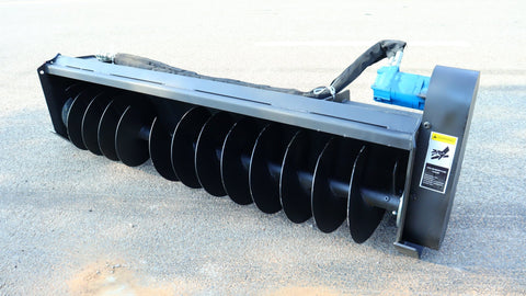 Trenching tool mounted on Bobcat-style skid steer