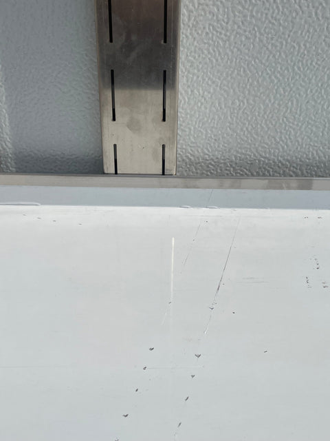 Stainless steel wall-mounted shelf front view
Close-up of shelf bracket and mounting
Side view of stainless steel shelf over prep station
Commercial wall shelf above kitchen counter
Single-tier wall shelf with polished finish