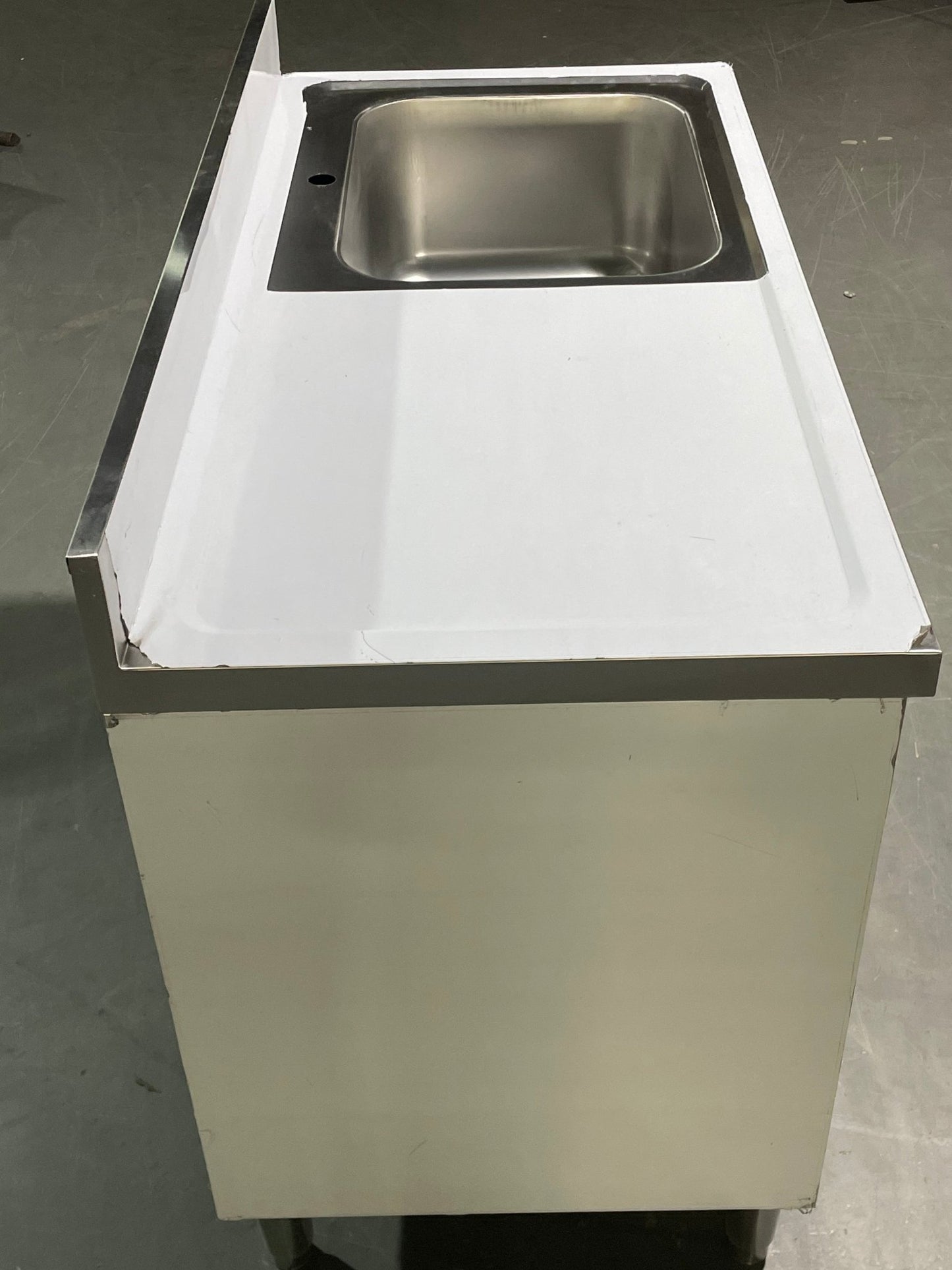 Stainless steel utility sink with 3 drawers front view
Commercial sink cabinet for restaurant or kitchen use
Stainless sink station with pull-out storage drawers
Industrial-grade sink unit with integrated storage
Compact kitchen sink workstation for food prep areas