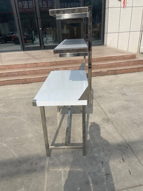 Stainless steel prep table with integrated overshelf – front view
Commercial-grade kitchen work table with upper storage
1200mm stainless prep station with dual-tier design
Heavy-duty stainless kitchen table – side angle
Restaurant overshelf prep table – silver finish