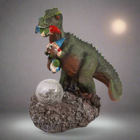 Funny dinosaur garden gnome massacre solar LED light
T-Rex devouring gnomes solar statue for garden decor
Outdoor dinosaur light with solar-powered LED illumination