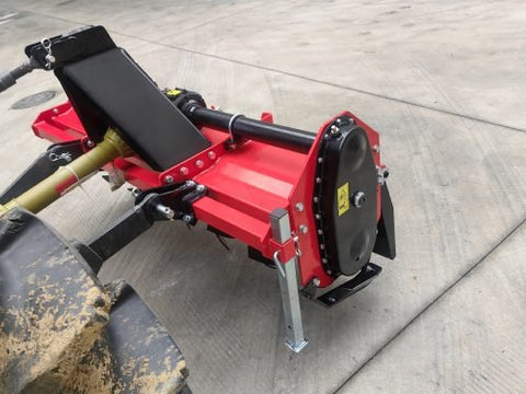 71 inch PTO rotary tiller for tractors
Red 3-point rotary tiller with 42 tines
Side view of heavy-duty tractor tiller attachment
PTO-powered tiller for 40-75 HP tractors
Rear garden rotary tiller with safety guard
Rotary tiller in warehouse – SKU IGN180