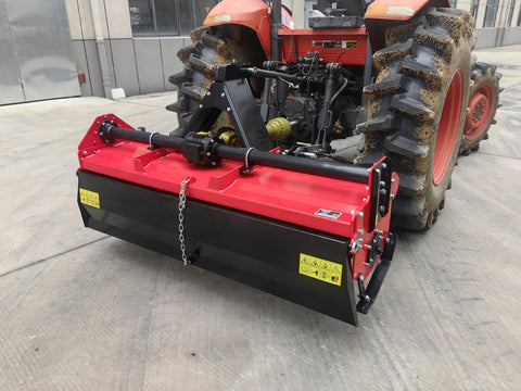 71 inch PTO rotary tiller for tractors
Red 3-point rotary tiller with 42 tines
Side view of heavy-duty tractor tiller attachment
PTO-powered tiller for 40-75 HP tractors
Rear garden rotary tiller with safety guard
Rotary tiller in warehouse – SKU IGN180
