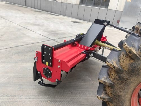 71 inch PTO rotary tiller for tractors
Red 3-point rotary tiller with 42 tines
Side view of heavy-duty tractor tiller attachment
PTO-powered tiller for 40-75 HP tractors
Rear garden rotary tiller with safety guard
Rotary tiller in warehouse – SKU IGN180