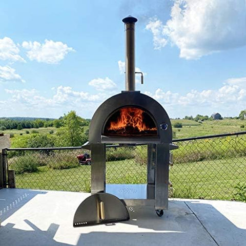 Full pizza oven on patio with wood and gas tank connected