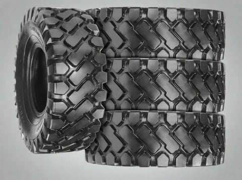Heavy-duty E-3/L3 bias ply loader tire on warehouse floor
Rock lug pattern close-up for traction
20.5-25 loader tire tread and sidewall view
Mining OTR tire mounted on equipment
Rugged loader tire for industrial applications