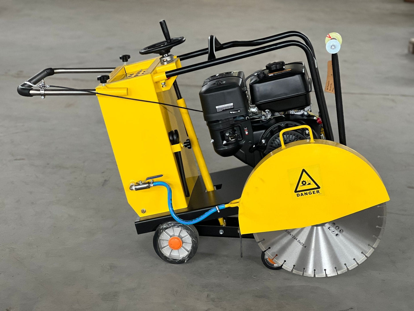 Walk-behind concrete saw T300 front view
T500 heavy-duty floor cutting machine
Portable concrete saw in yellow – side profile
Professional-grade walk-behind saw for road work
Compact construction cutter for slab and trench