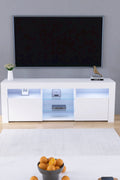 Modern white LED TV cabinet with storage drawers
High gloss entertainment unit with open shelves
Side view of LED-lit TV cabinet setup
Drawer and compartment detail in white gloss TV unit