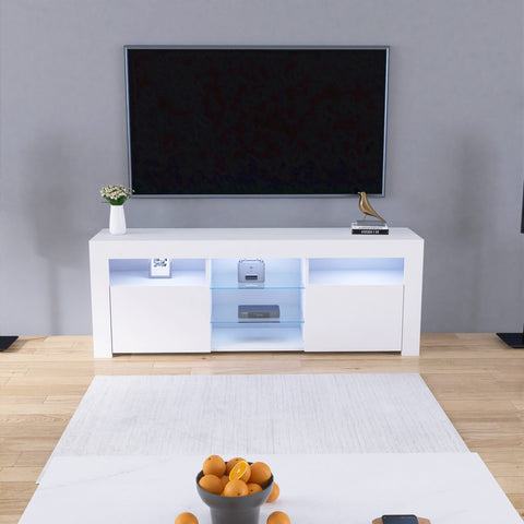 Modern white LED TV cabinet with storage drawers
High gloss entertainment unit with open shelves
Side view of LED-lit TV cabinet setup
Drawer and compartment detail in white gloss TV unit
