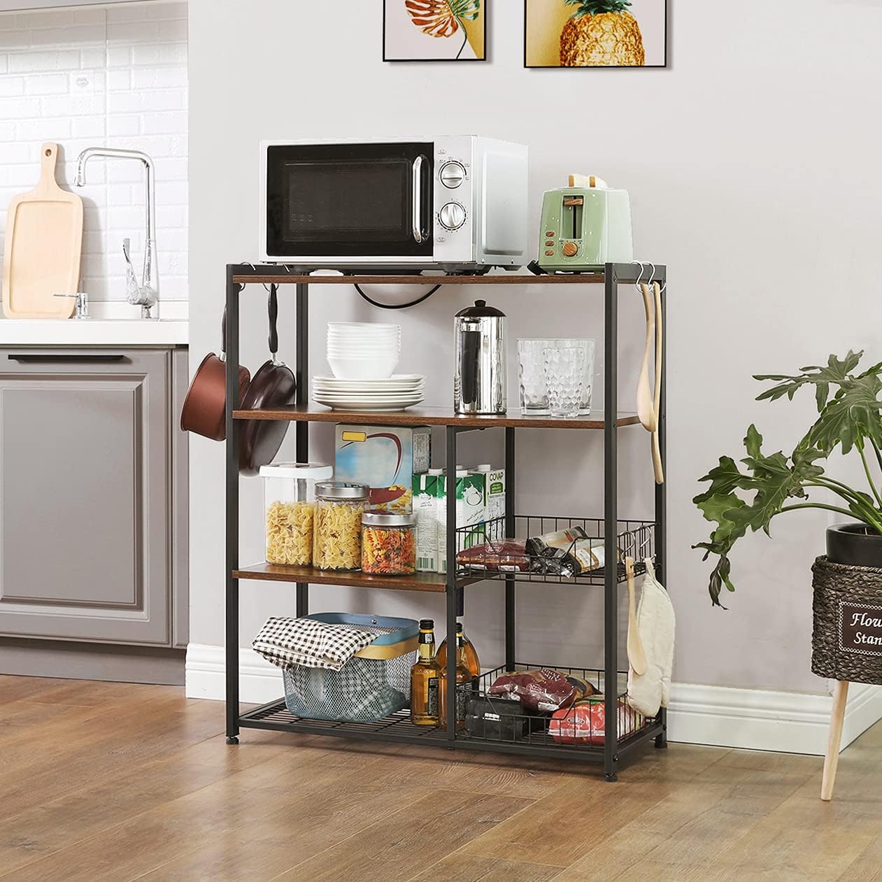 Industrial kitchen bakers rack with microwave shelf
3-tier metal kitchen rack with wooden shelves
Bakers rack with mesh baskets and utensil hooks
Microwave-ready kitchen organizer with rustic wood finish
Side view of heavy-duty kitchen storage rack