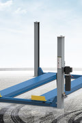 Blue 4-post car lift in a workshop setting

Top-down view of the HFL4065E vehicle lift

Vehicle raised on blue 4-post lift

Hydraulic-powered truck lift hoist

Portable heavy-duty automotive lift with ramps