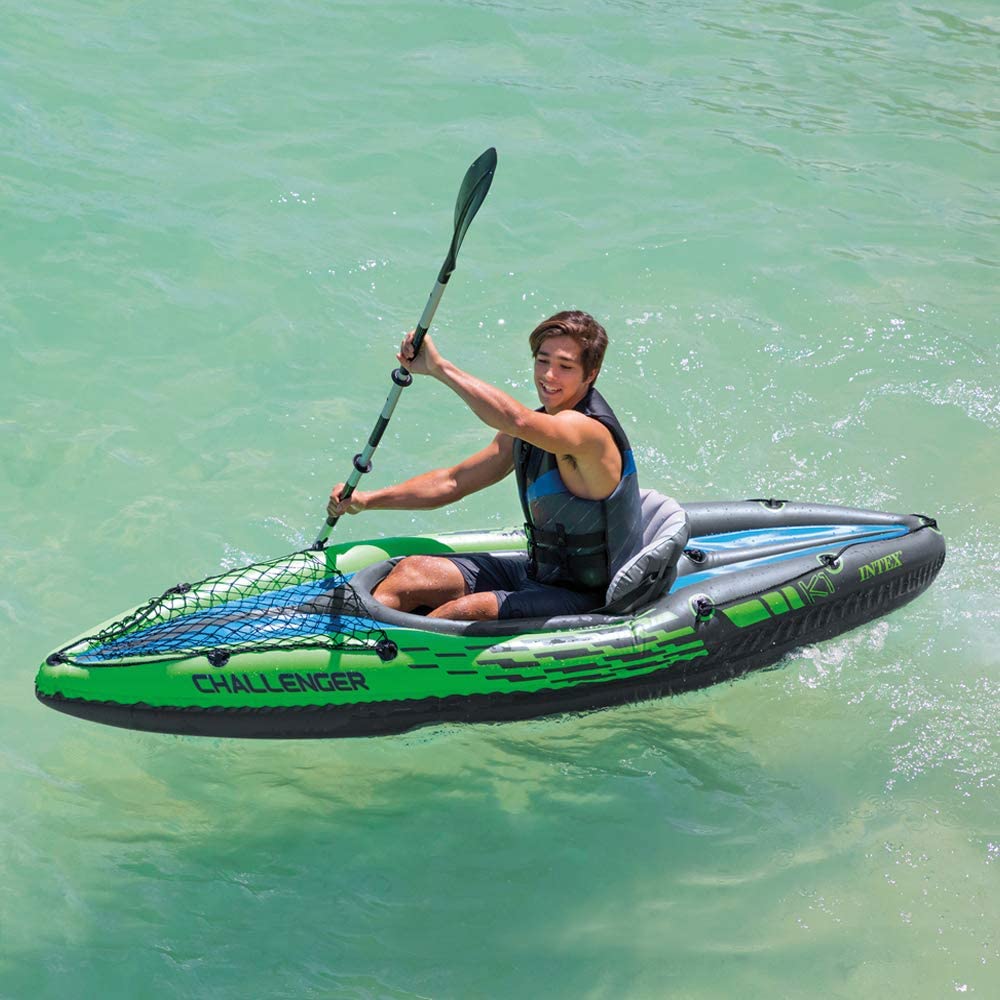 Intex Challenger K1 inflatable kayak on water

1-person green inflatable kayak set with oar and pump

Inflatable kayak with seat and cargo net

Kayak set components: paddle, pump, skeg, repair patch

Recreational lake kayak for solo paddlers
