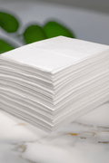 Close-up of oil absorbent pads texture and 1-ply design – lightweight and durable
