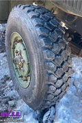 11.00R20 Michelin – Military Surplus Tire & Rim Assembly (Assorted Tread Patterns) - with Grade A - Very Minor Cracking if any | Sold by Uncle Wiener's Wholesale
