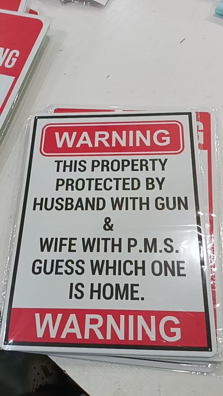 12" x 16" Metal Warning & Novelty Signs Outdoor Tin Wall Signs 91610SET - with Protected By Husband With Gun | Sold by Uncle Wiener's Wholesale
