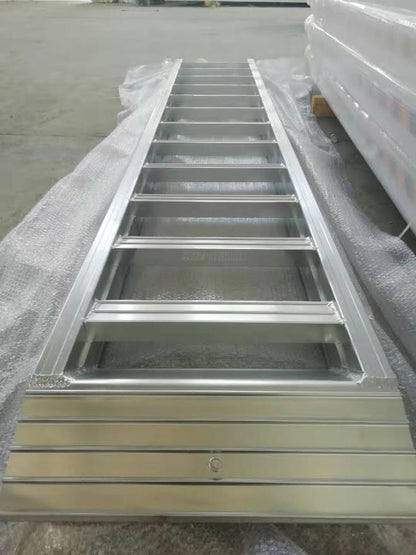 10-foot aluminum loading ramps placed on utility trailer
Heavy-duty HDR300 loading ramps close-up with grip detail
Side view of aluminum ramp showing gradual incline
Vehicle approaching wide aluminum loading ramps
Industrial pair of loading ramps for heavy machinery