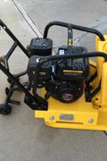 14-inch commercial vibratory plate compactor with yellow steel frame and water tank