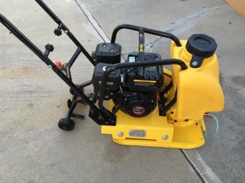 14-inch commercial vibratory plate compactor with yellow steel frame and water tank
