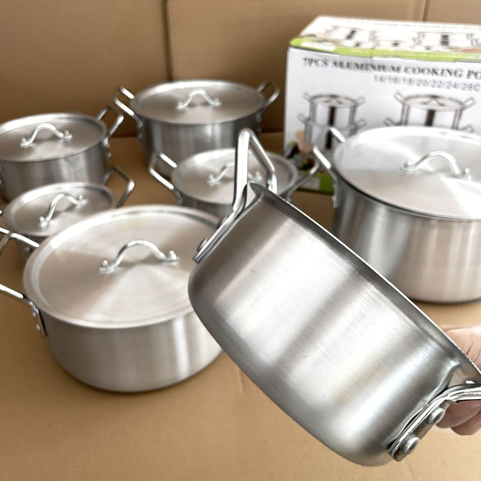 14-Piece Aluminum Cookware Set with Lids Stainless Steel Handles TKQQ46 - with | Sold by Uncle Wiener's Wholesale