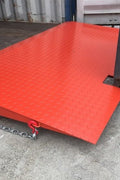 Textured steel ramp surface designed for forklift traction and safety