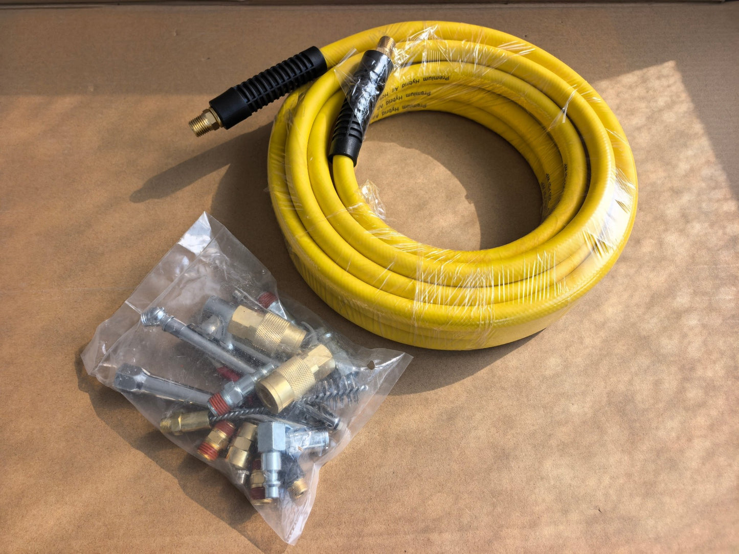 19 - Piece Air Compressor Accessory Kit with 3/8" × 25 ft Hybrid Hose, Quick Connect Fittings, Blow Gun & Tire Gauge – 19382514 - with | Sold by Uncle Wiener's Wholesale