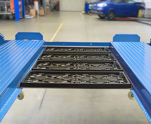 Blue portable 4-post car hoist in garage

Drive-on ramp and runway surface

Close-up of power unit and lift columns

Vehicle elevated on blue car lift

Heavy-duty safety locks and cable system