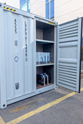 Exterior view of 40 FT insulated container office cabin

Interior layout showing vinyl flooring and workstations

TPS insulated walls and faux leather trim details

Plumbing and water system built into mobile cabin

Rear angle showing door and window design