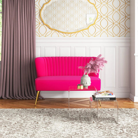 Fuchsia velvet loveseat with tufted back and gold legs in modern decor.
Ivory armless loveseat sofa with mid-century design in studio setup.
Tan velvet 2-seater with flared gold legs styled against a neutral wall.
Close-up of plush velvet texture and fluted backrest detail.
Color swatches displaying Fuchsia, Pink, Ivory, and Tan options.