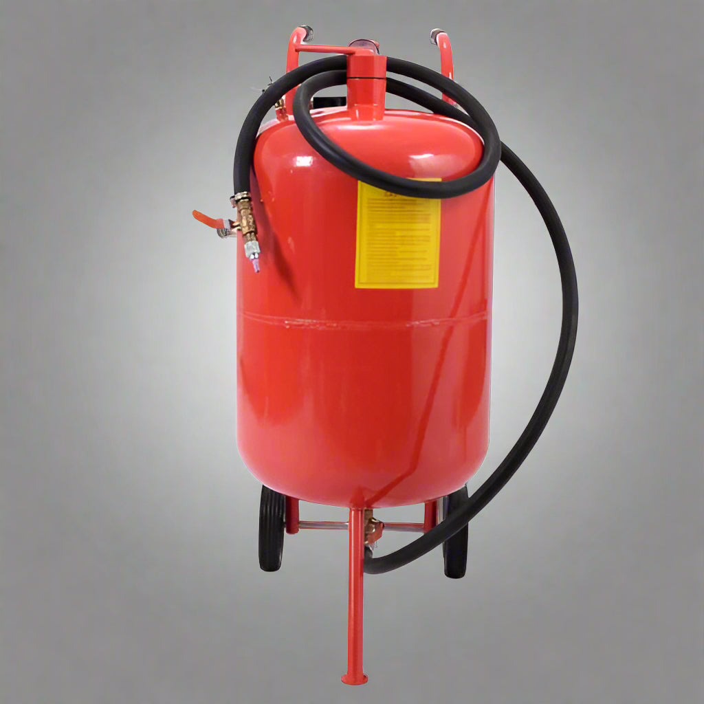 Red 20-gallon portable sandblasting tank with hose, wheels, and blasting accessories for rust and paint removal
