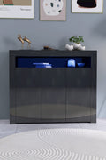 Black LED gloss sideboard in living room with lights on
White gloss LED storage cabinet with soft glow
Close-up of cabinet doors with glossy finish
Side angle showing multicolor LED lighting
Living room setup with LED sideboard beneath TV
White version styled in modern kitchen