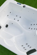Front view of compact 3-person outdoor acrylic hot tub spa