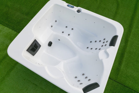 Front view of compact 3-person outdoor acrylic hot tub spa