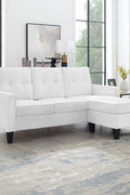 Reversible black sectional sofa in small apartment

Brown 3-seater L-shaped couch in modern room

White PU leather couch with chaise on right

Compact living room with small space sectional