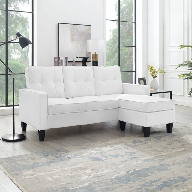 Reversible black sectional sofa in small apartment

Brown 3-seater L-shaped couch in modern room

White PU leather couch with chaise on right

Compact living room with small space sectional