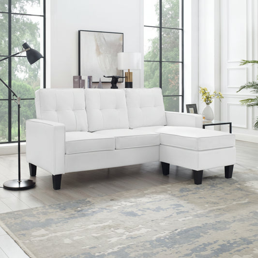 Reversible black sectional sofa in small apartment

Brown 3-seater L-shaped couch in modern room

White PU leather couch with chaise on right

Compact living room with small space sectional