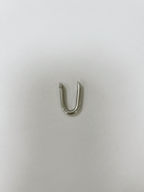 30-pound box of galvanized U-nail fence staples for wood posts
Heavy-duty wire fence staples with hot-dipped galvanized finish
Close-up of sharp tip U-shaped fencing nails for farm use
Fence hardware staples bulk packaging for wire and netting