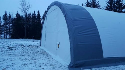 Side profile of assembled portable shelter in snow condition
