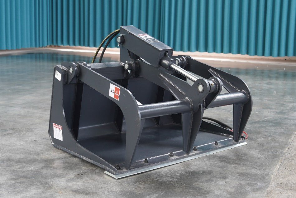 36″ Smooth Bucket Grapple for Mini Skid Steer – Front View

Hydraulic Dual-Arm Mini Skid Steer Grapple Bucket

Top Angle of 36″ Grapple Attachment on Pallet

Compact Skid Steer Grapple Bucket in Black Steel Finish