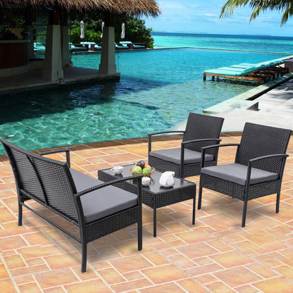 4 - Piece Outdoor Rattan Patio Furniture Set with Cushions & Glass Coffee Table 726201 - with | Sold by Uncle Wiener's Wholesale