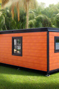 Exterior view of 40FT prefab folding home with orange steel siding