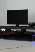 Modern RGB LED TV stand with lights under flat-screen TV
Black gloss entertainment unit with RGB lights in living room
White TV console with open shelving and LED lighting
Stylish high gloss media cabinet with mood lighting
Contemporary entertainment center for 75 inch TVs