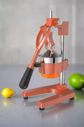 Manual citrus juicer press orange color
Side view of handheld orange and lemon juicer
Cast iron lemon press in use
Heavy-duty juicer squeezing citrus fruit
Handheld orange juicer with removable parts