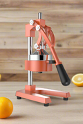 Manual citrus juicer press orange color
Side view of handheld orange and lemon juicer
Cast iron lemon press in use
Heavy-duty juicer squeezing citrus fruit
Handheld orange juicer with removable parts
