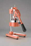 Manual citrus juicer press orange color
Side view of handheld orange and lemon juicer
Cast iron lemon press in use
Heavy-duty juicer squeezing citrus fruit
Handheld orange juicer with removable parts