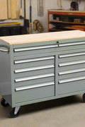 46-inch heavy-duty tool workbench with drawers
Mobile storage cabinet with wood top and wheels
Rolling tool bench in orange and black
Garage workbench with 9 locking drawers