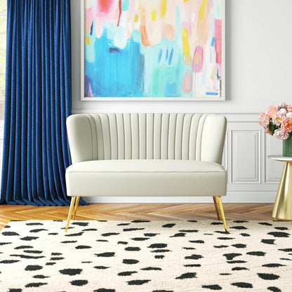 Fuchsia velvet loveseat with tufted back and gold legs in modern decor.
Ivory armless loveseat sofa with mid-century design in studio setup.
Tan velvet 2-seater with flared gold legs styled against a neutral wall.
Close-up of plush velvet texture and fluted backrest detail.
Color swatches displaying Fuchsia, Pink, Ivory, and Tan options.