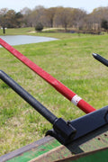 Triple Hay Bale Spears Attachment – Mounted on Loader

49-Inch Spear Fork Attachment – Top View

Bucket Attachment for Hay Bales – Side View

HY49 Red Steel Frame with Spears – Ground Placement

Close-up of Chains and Turnbuckle on Bucket Attachment

