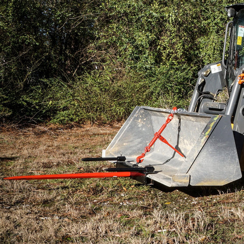 Triple Hay Bale Spears Attachment – Mounted on Loader

49-Inch Spear Fork Attachment – Top View

Bucket Attachment for Hay Bales – Side View

HY49 Red Steel Frame with Spears – Ground Placement

Close-up of Chains and Turnbuckle on Bucket Attachment

