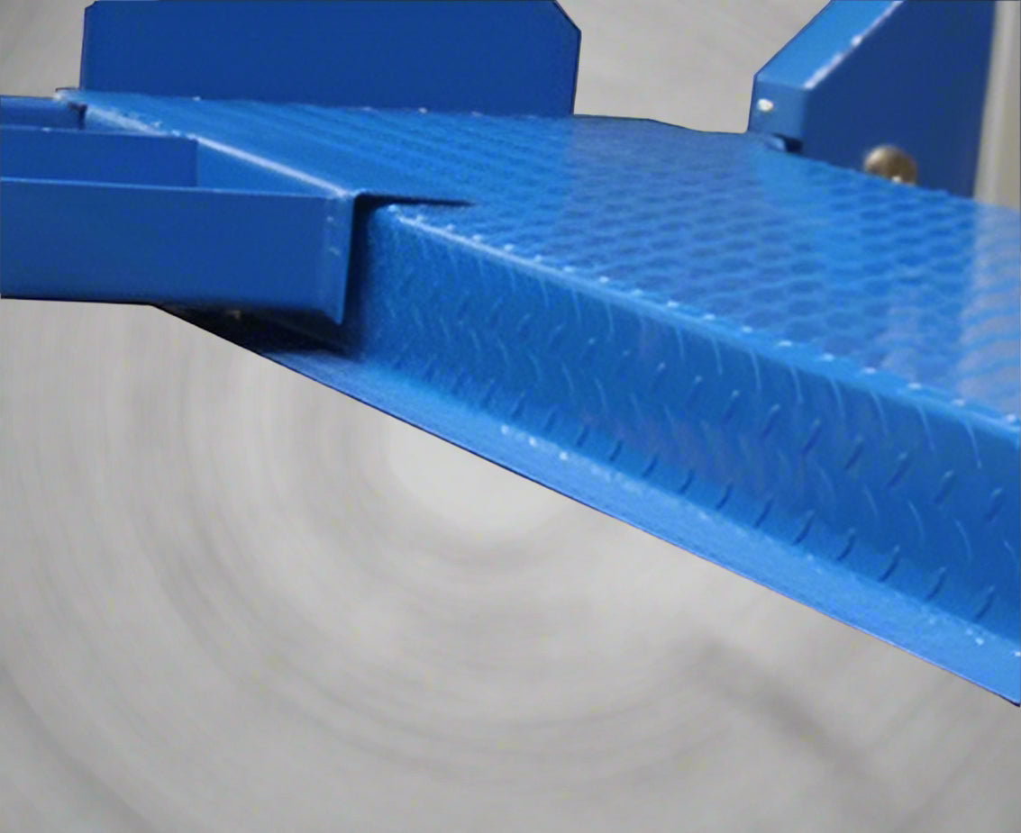 Blue portable 4-post car hoist in garage

Drive-on ramp and runway surface

Close-up of power unit and lift columns

Vehicle elevated on blue car lift

Heavy-duty safety locks and cable system